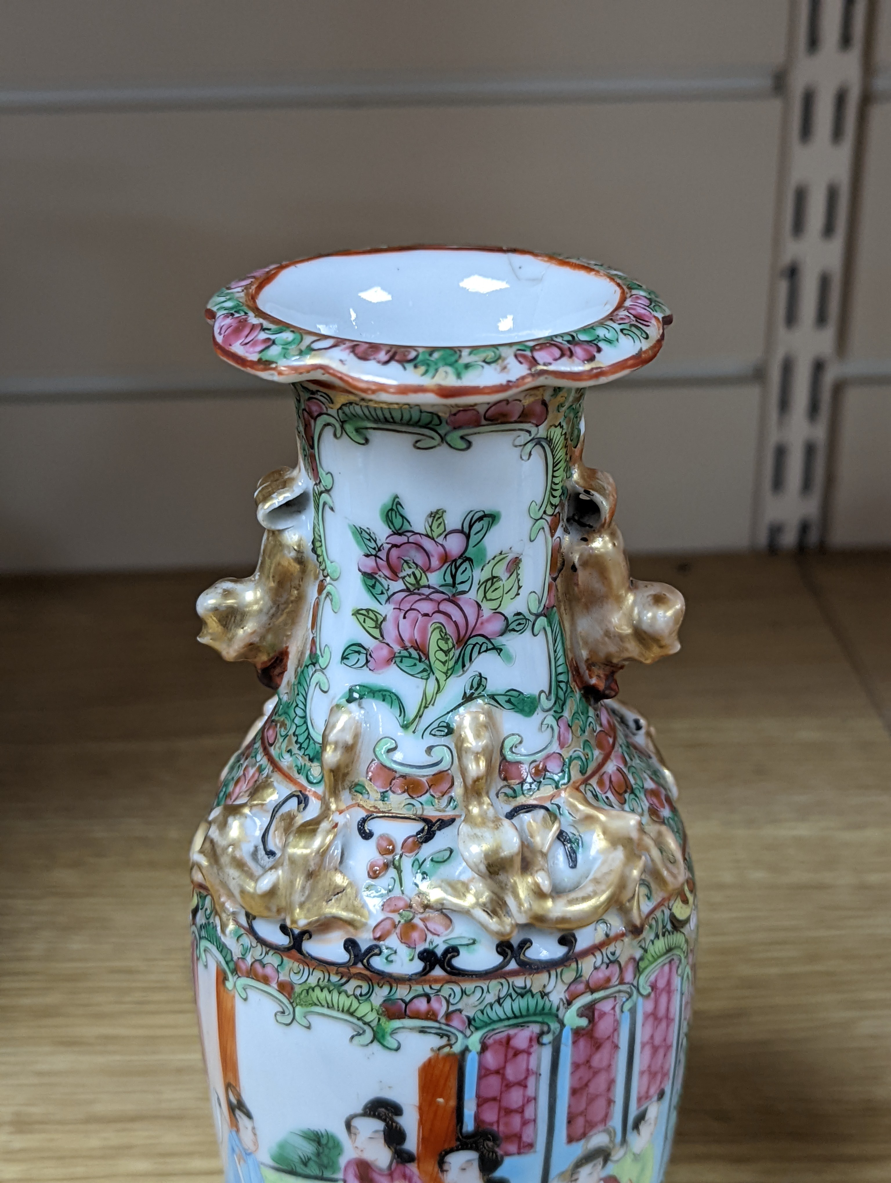 Four 19th century Chinese famille rose vases, 21cm